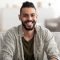 portrait-of-attractive-young-arab-man-smiling-and-2025-03-18-17-26-53-utc.jpg